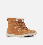 Load image into Gallery viewer, Front right view of a pair of brown suede ankle boots. Has brown laces.
