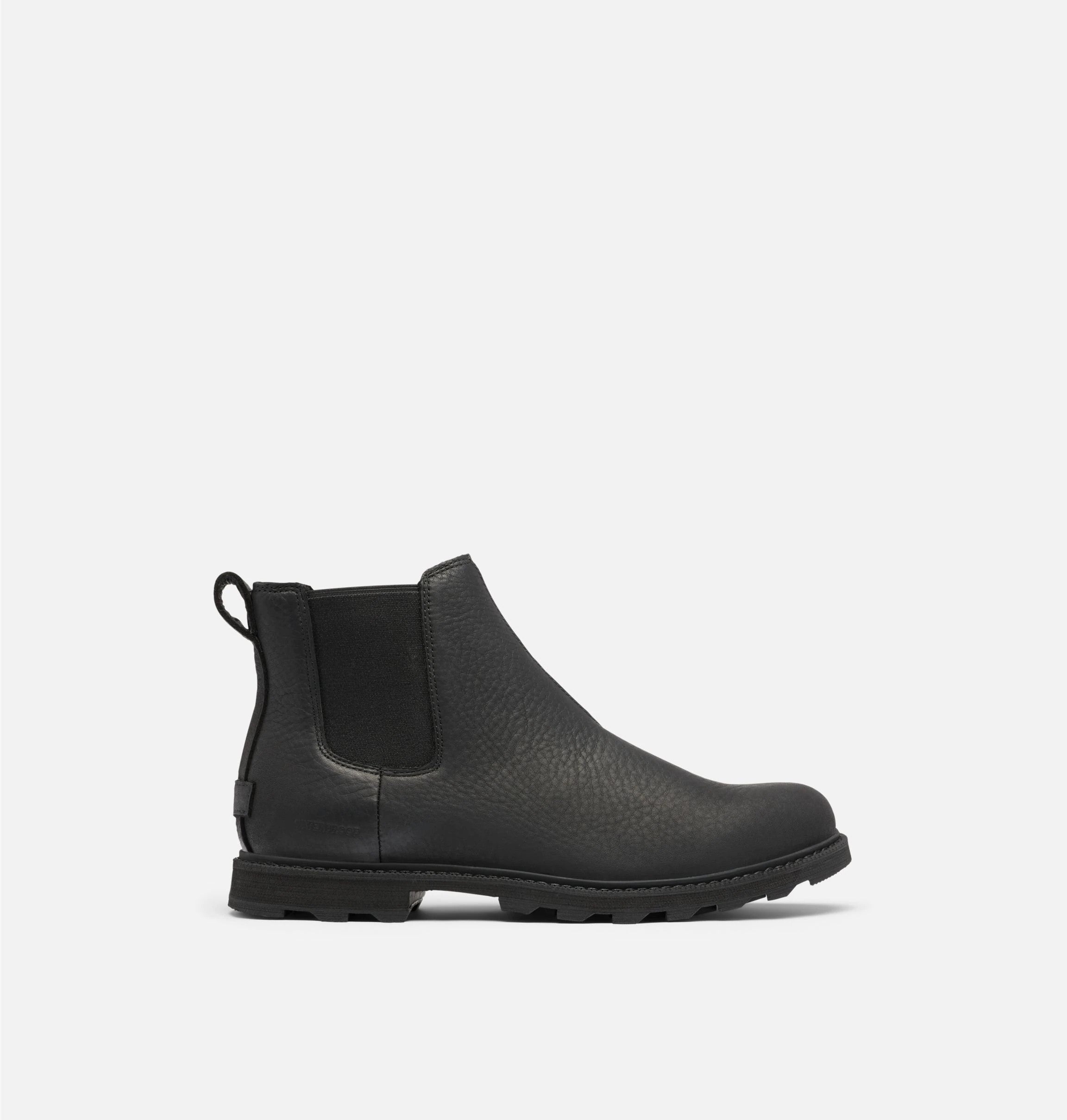 Side view of matte black leather boot on white background. It is a Chelsea boot and has no laces.