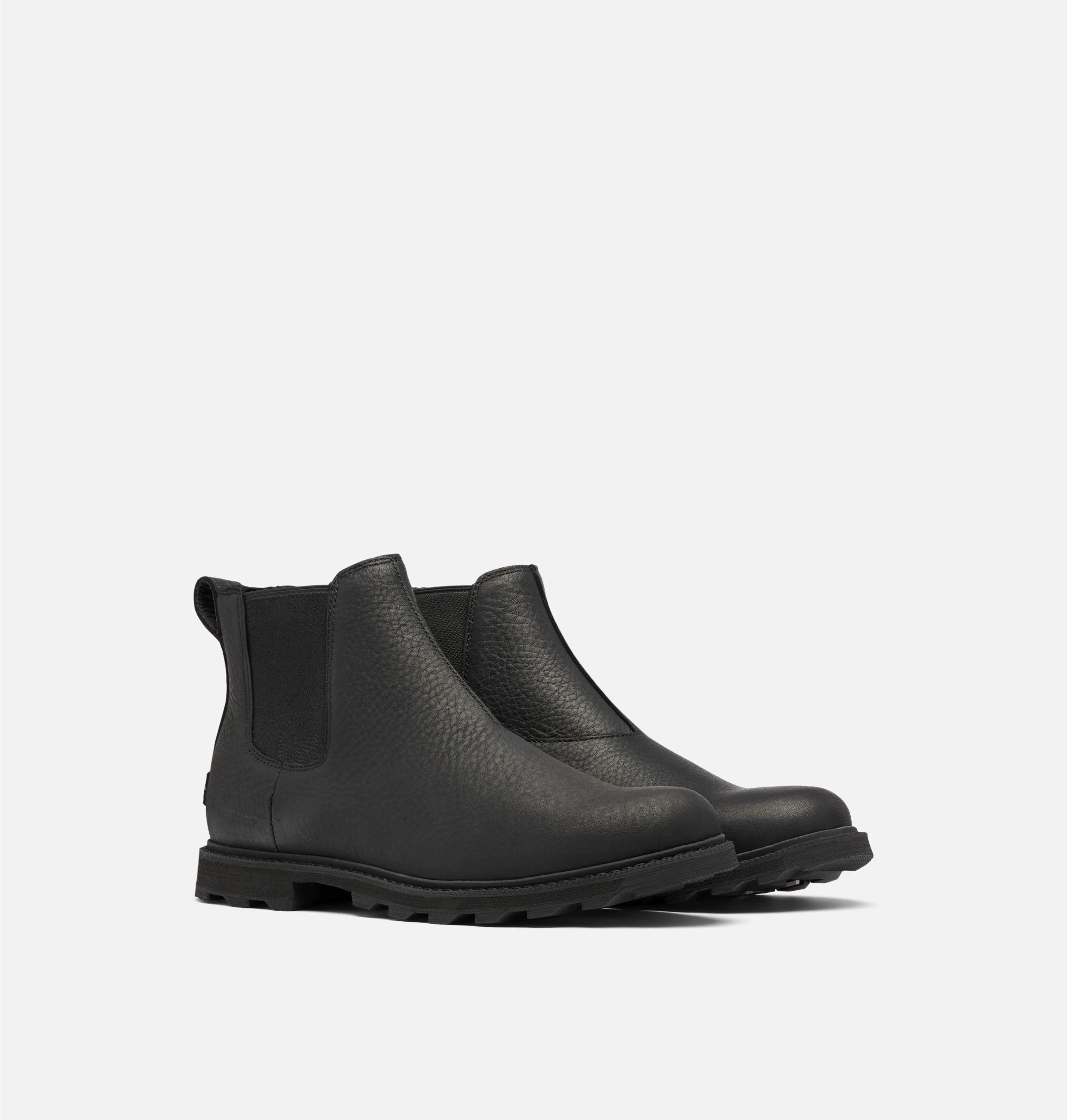 Front right view of a pair of matte black leather ankle boots. Has no laces.