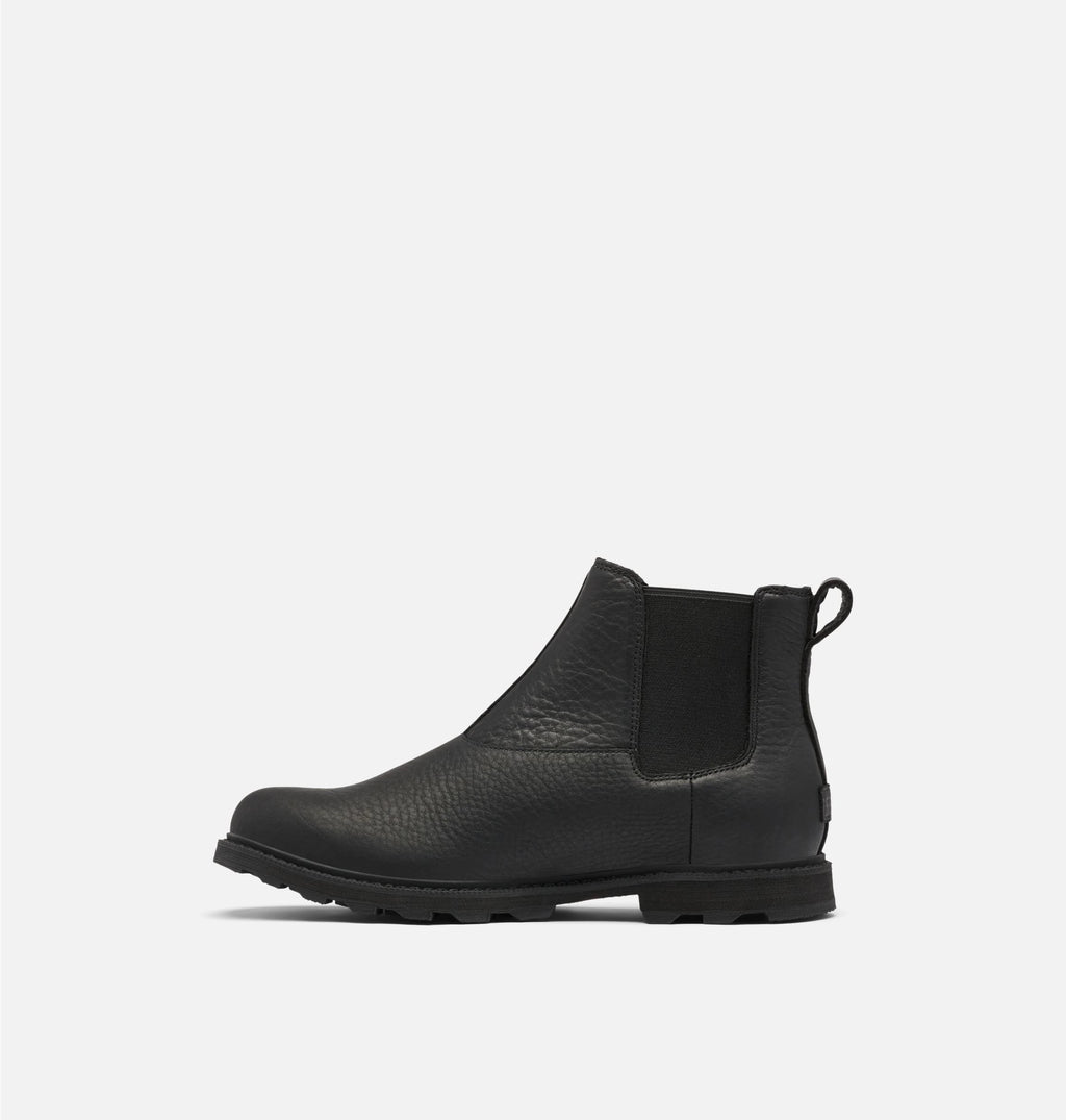 Side view of matte black leather boot on white background. It is a Chelsea boot and has no laces.