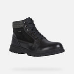 Load image into Gallery viewer, Black leather winter ankle boot on white background. Features glossy black leather, waterproof suede and black laces.
