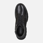 Load image into Gallery viewer, Top view of black leather winter ankle boot. Has black laces and boot is glossy.
