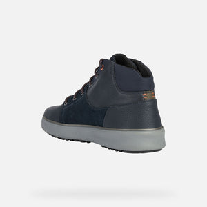 Rear left angle of dark blue ankle boot on white background