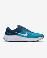 Load image into Gallery viewer, Side view of blue Nike running shoe on white background. Has 2 different accents of blue; dark blue and light blue. It has a white midsole and a white inverted Nike logo on the side.
